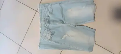 Pantalón de mezclilla desgastados celestes - miniatura 1