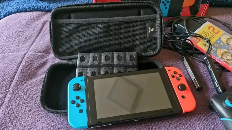 Consola Nintendo Switch con accesorios y juego - 2