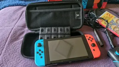 Consola Nintendo Switch con accesorios y juego - miniatura 2