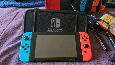 Consola Nintendo Switch con accesorios y juego - miniatura 3