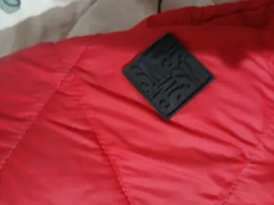Chaqueta acolchada roja unisex - miniatura 1