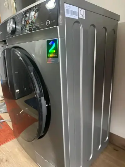 Lavadora secadora Midea 9.5 kg gris - miniatura 3