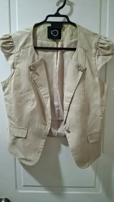 Chaleco beige sin mangas para mujer - miniatura 1