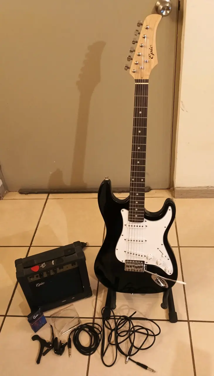 Guitarra eléctrica Epiphone con amplificador - 1