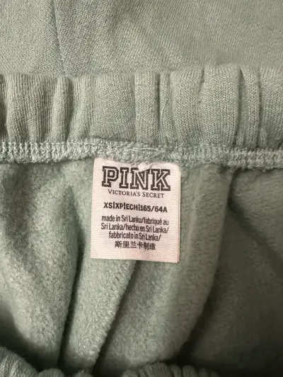 Pantalones deportivos verdes con diseño lateral - miniatura 3