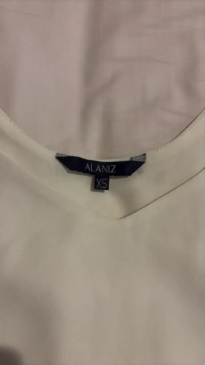 Blusa blanca sin mangas Alaniz - 2