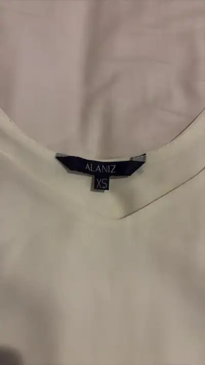 Blusa blanca sin mangas Alaniz - miniatura 2