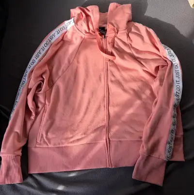 Polerón rosado con capucha y cierre Nike - miniatura 1