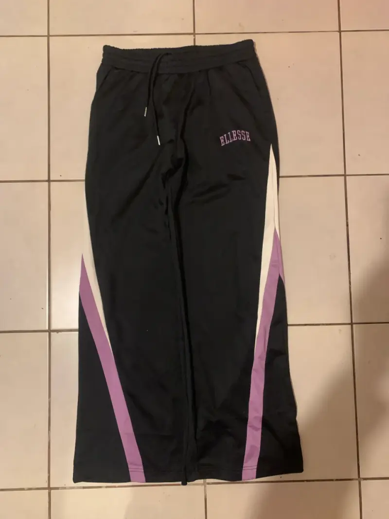 Pantalones deportivos Ellesse negros con franjas - 1