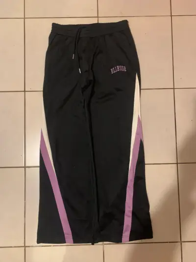 Pantalones deportivos Ellesse negros con franjas - miniatura 1