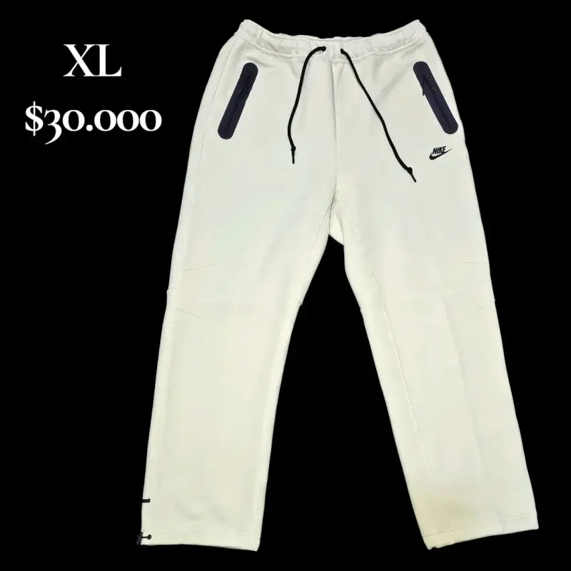 Pantalones deportivos Nike blancos con bolsillos - 1