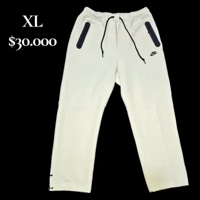 Pantalones deportivos Nike blancos con bolsillos - miniatura 1