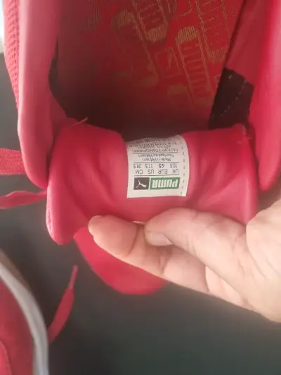 Zapatillas Puma rojas cm 29.5 - miniatura 1