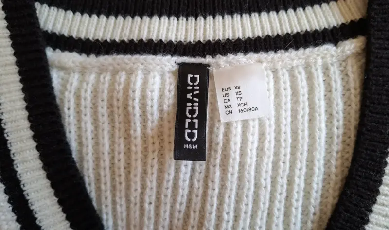 Chaleco sin mangas blanco y negro de punto - 2
