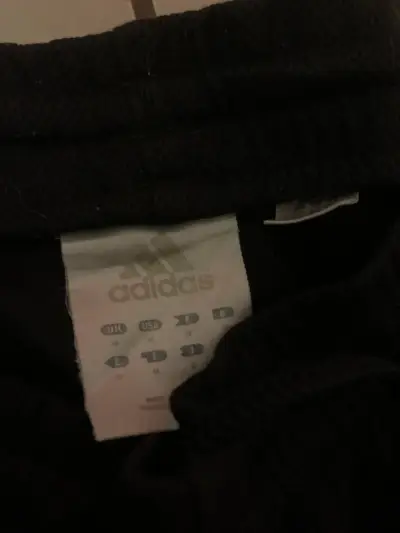 Pantalones deportivos Adidas negros con franjas - miniatura 2