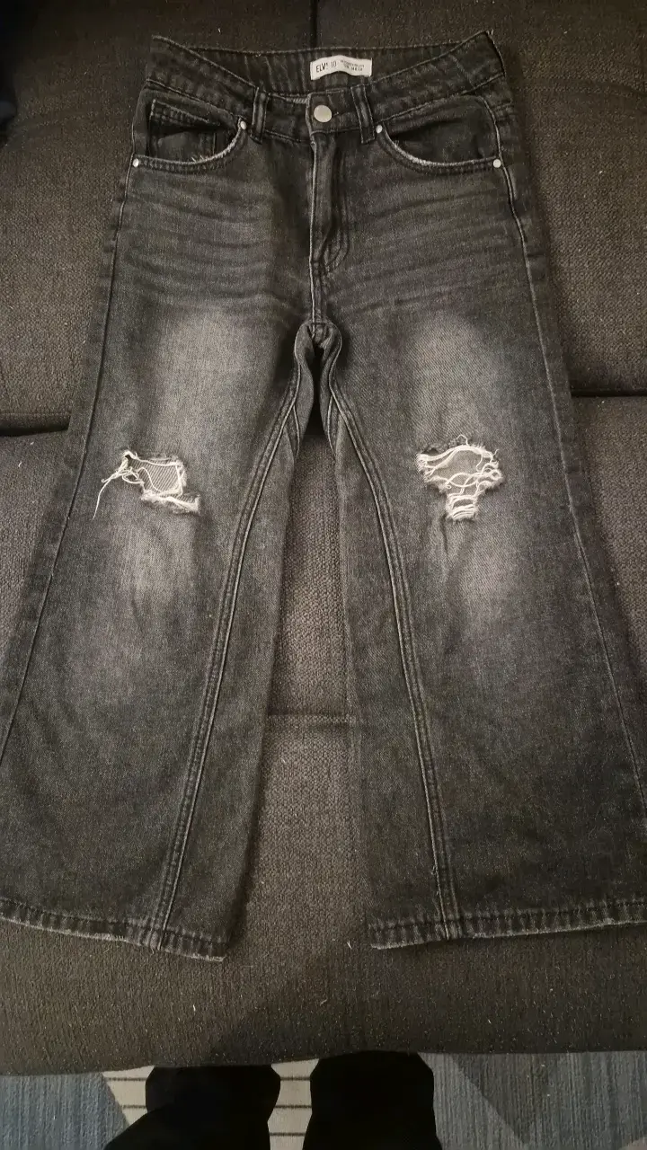 Jeans negros desgastados