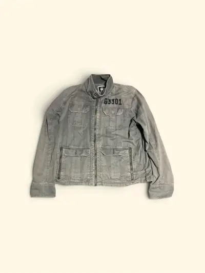 Chaqueta gris con cierre y bolsillos - miniatura 1