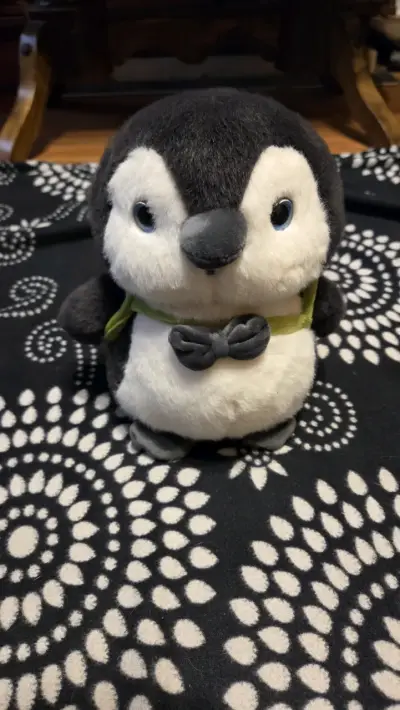 Peluche pingüino con corbatín - miniatura 1