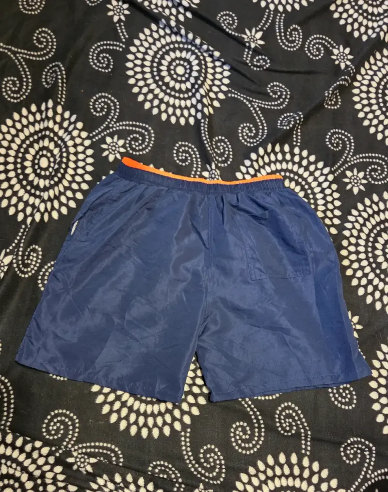 Shorts de baño azul con detalles naranjas - 2