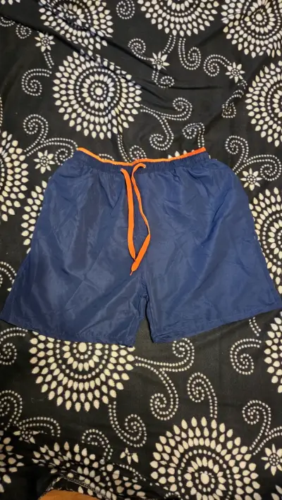 Shorts de baño azul con detalles naranjas - miniatura 3
