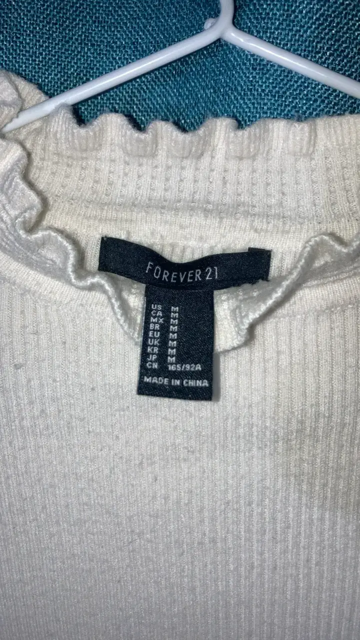 Suéter blanco de punto con cuello alto - 2