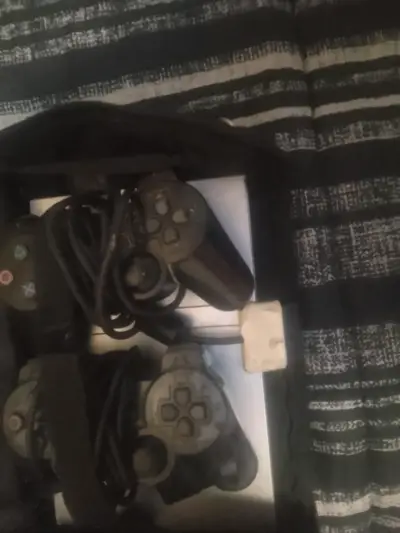 Consola PlayStation 2 con dos controles - miniatura 1