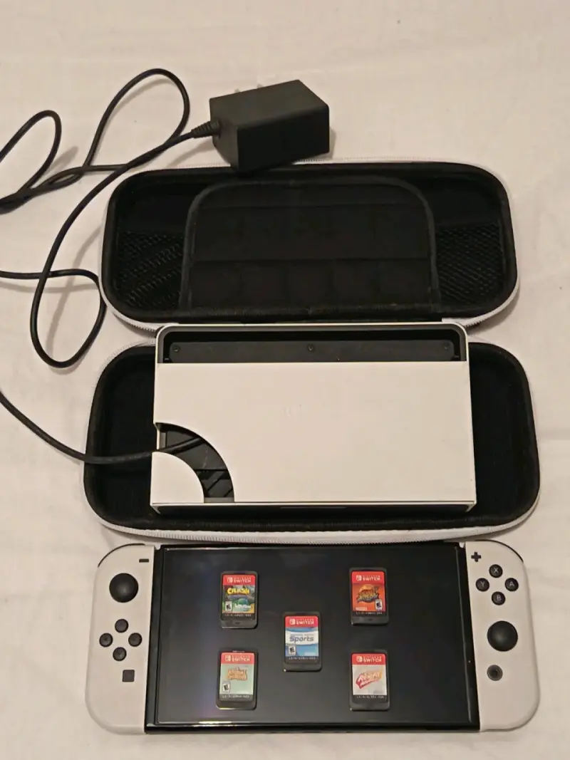 Consola Nintendo Switch OLED con juegos y accesorios