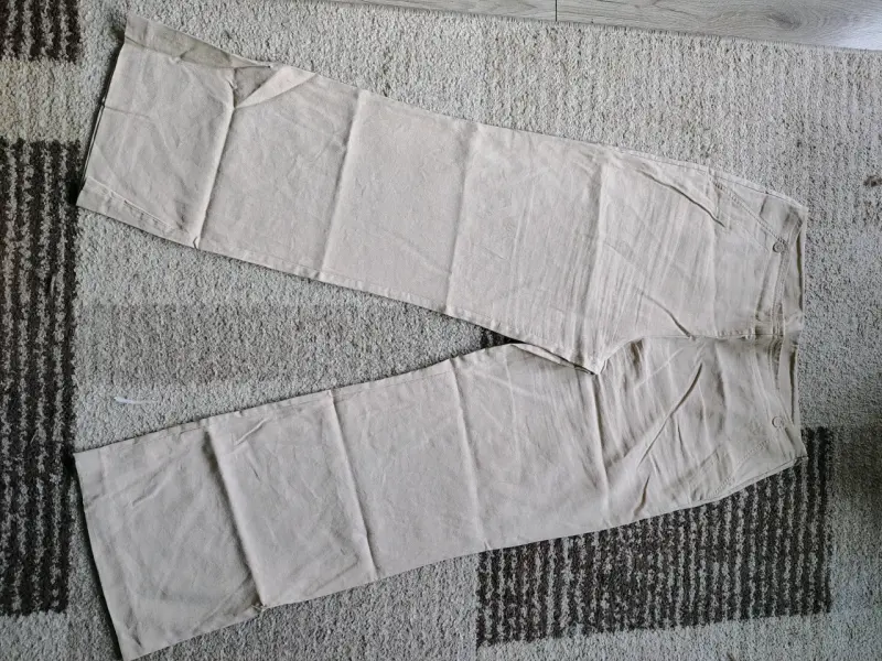 Pantalones beige de algodón para mujer