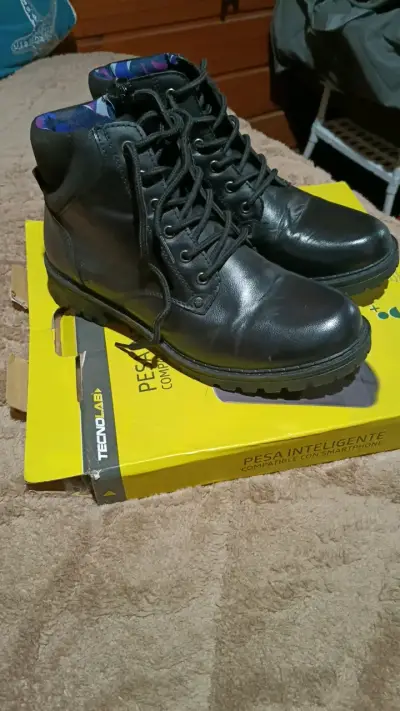 Botas de cuero negro para mujer - miniatura 1