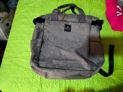 Mochila gris multifuncional de tela resistente - miniatura 2
