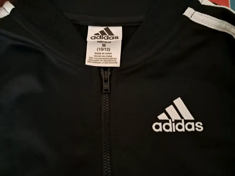 Chaqueta deportiva Adidas negra con franjas - 2
