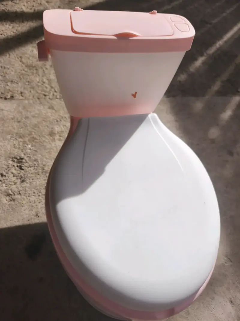 Bacinica infantil portátil rosa y blanca - 2