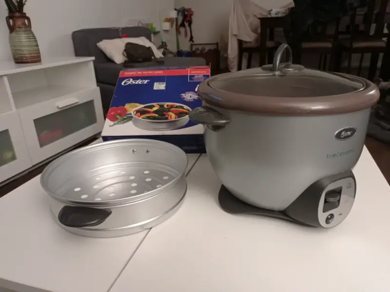 Arrocera Oster Bioceramic con bandeja vaporera - 1