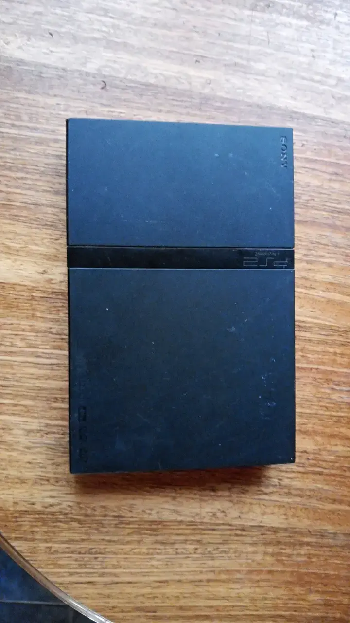 Consola PlayStation 2 Slim negra usada - 1