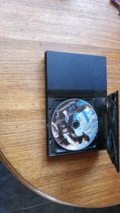 Consola PlayStation 2 Slim negra usada - miniatura 5