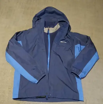 Chaqueta impermeable Marmot azul con capucha - miniatura 1