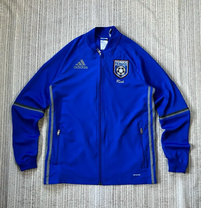 Chaqueta deportiva Adidas azul con logo - 1
