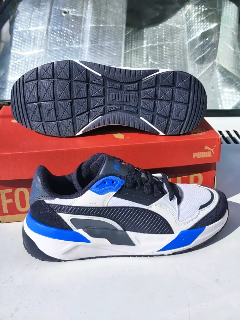 Zapatillas deportivas Puma blancas y azules - 1