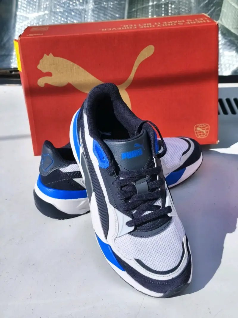 Zapatillas deportivas Puma blancas y azules - 2