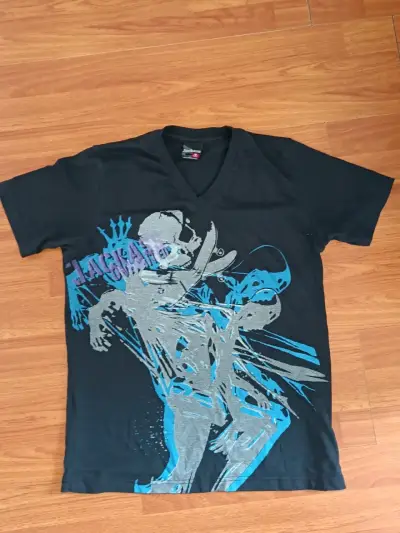 Polera negra con diseño gráfico skate - miniatura 1