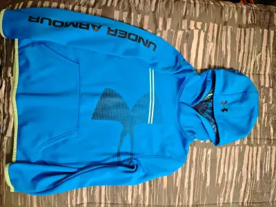 Polerón azul Under Armour con capucha - miniatura 1
