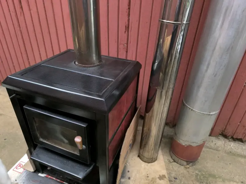 Estufa a combustion con tubo de acero inoxidable