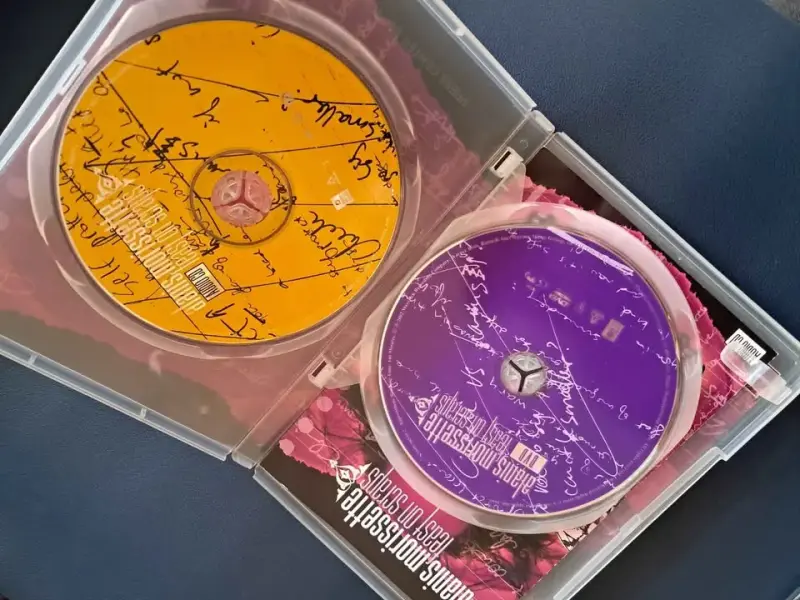CD + DVD ALANIS MORISSETTE - FEAST ON SCRAPS - 2