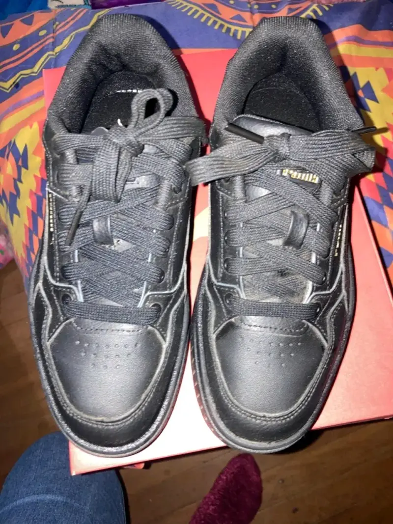 Zapatillas negras Puma deportivas - 4