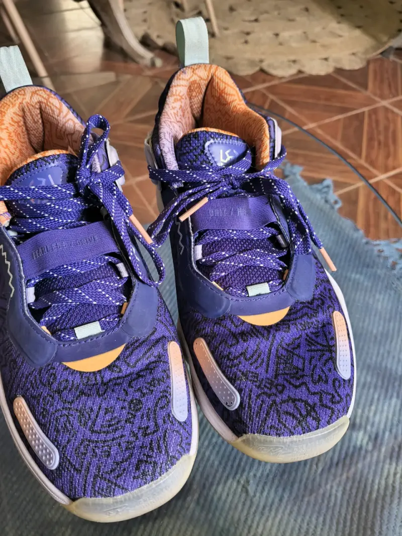 Zapatillas deportivas Nike moradas y naranjas - 6
