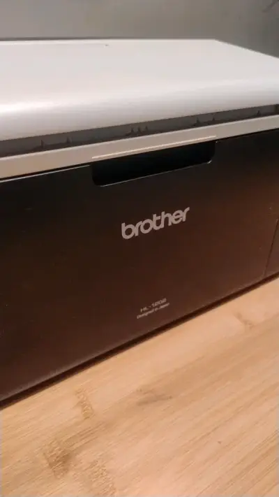 Impresora láser Brother HL-1202 compacta - miniatura 1