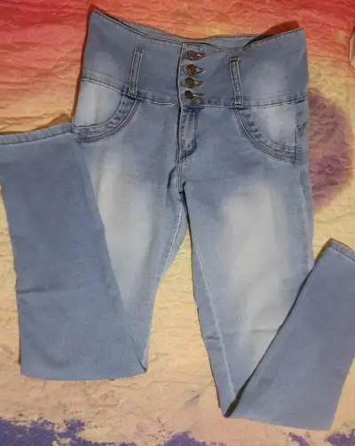 Jeans ajustados de tiro alto azul claro - miniatura 1