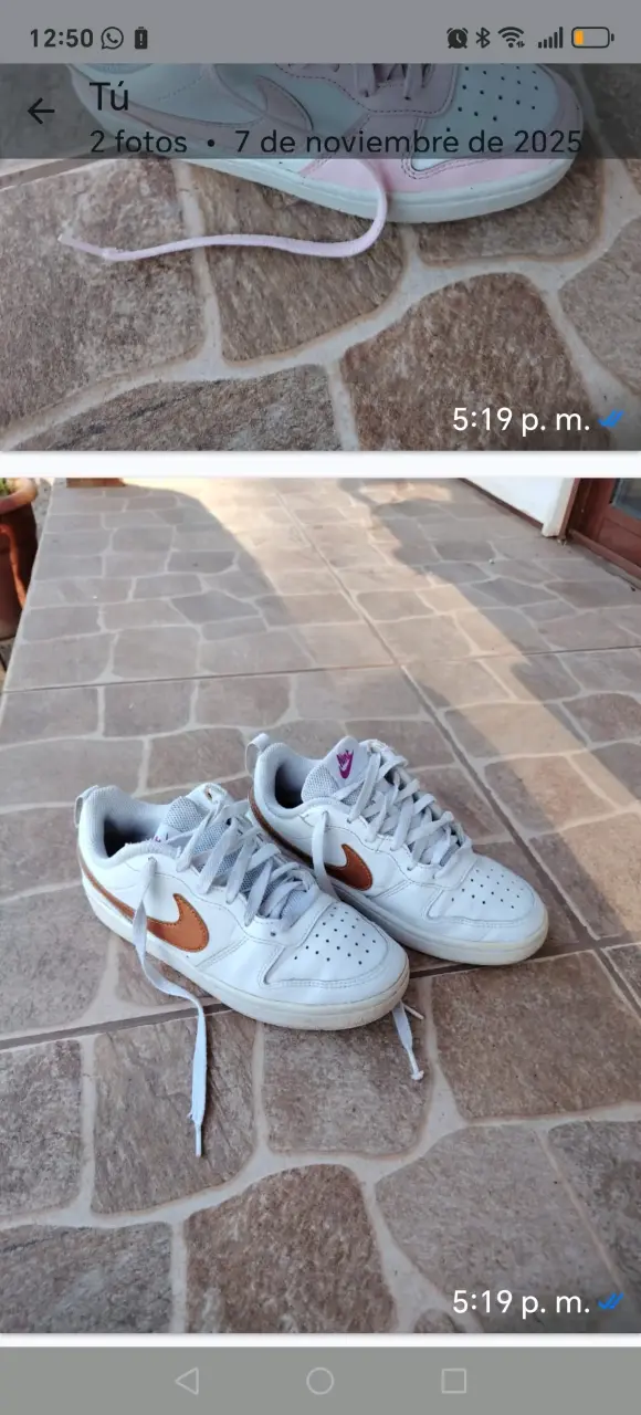 Zapatillas deportivas blancas con logo naranja