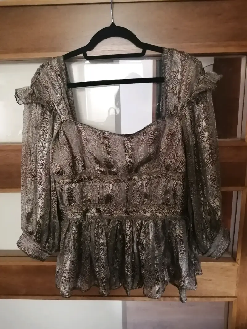 Blusa estampada de manga larga