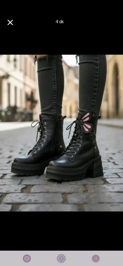Botas negras con diseño de alas - miniatura 2